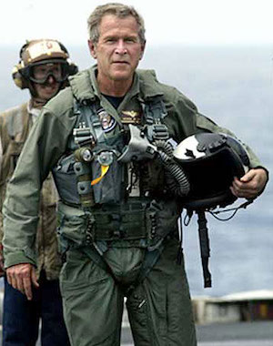 President George W. Bush in a flight suit after landing on the USS Abraham Lincoln to give his “Mission Accomplished” speech about the Iraq War on May 1, 2013.
