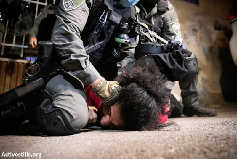 Israeli forces suppress a Palestinian protest against house evictions in Sheikh Jarrah. (Photo: Activestills)