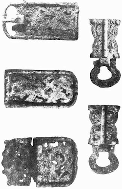 Solid aluminum belt fittings from a Dark Age grave in Nanjing.