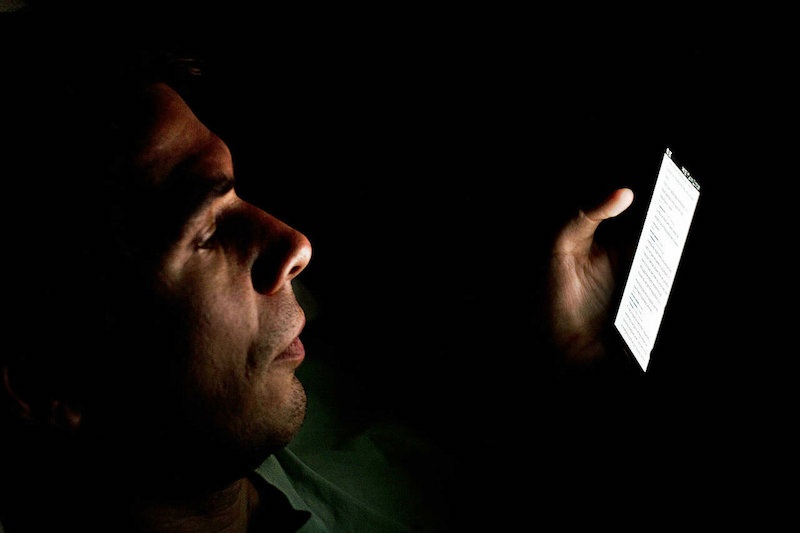 By Japanexperterna.se from Japan (Person looking at smartphone in the dark) [CC BY-SA 2.0 via Wikimedia Commons